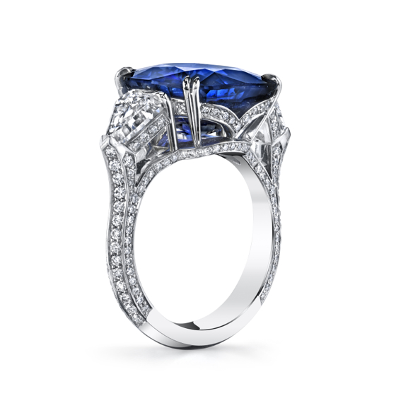 9.96 cts Ceylon Sapphire with two Shield cut diamonds and ideal cut pave diamonds set in platinum