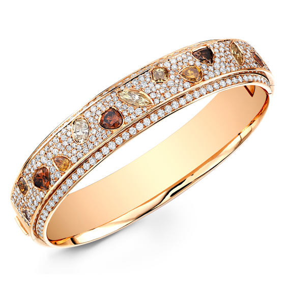Natural fancy color, mixed shape diamonds in 18K gold bangle bracelet by Krieger in Germany