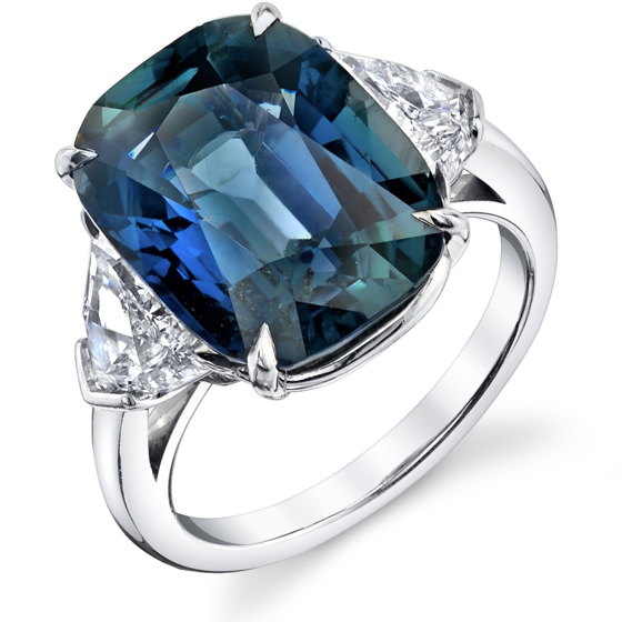 10.97 cts Unheated Color Change Sapphire set in hand fabricated platinum ring with shield cut diamonds